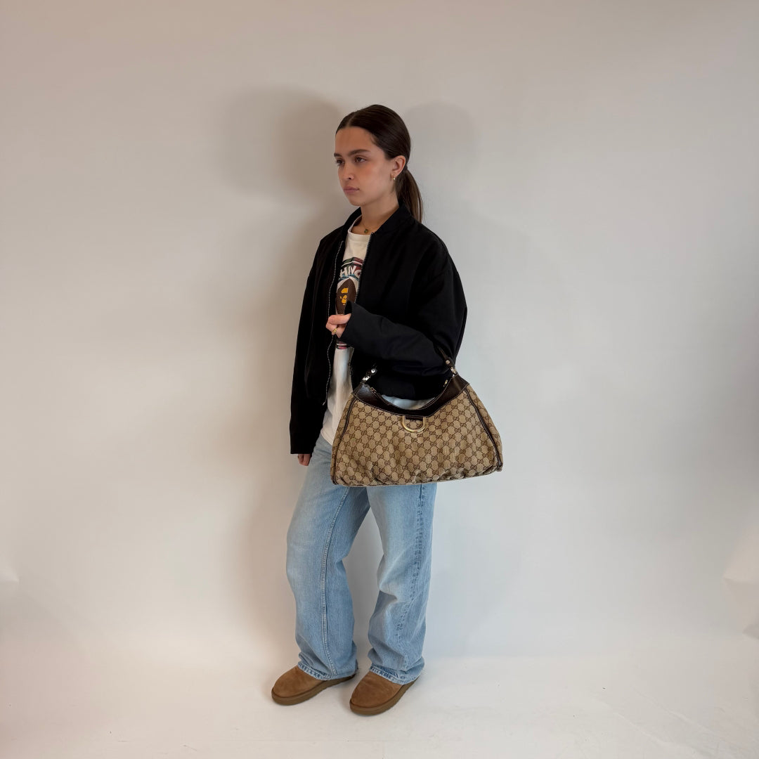 Borsa a tracolla con anello a D grande