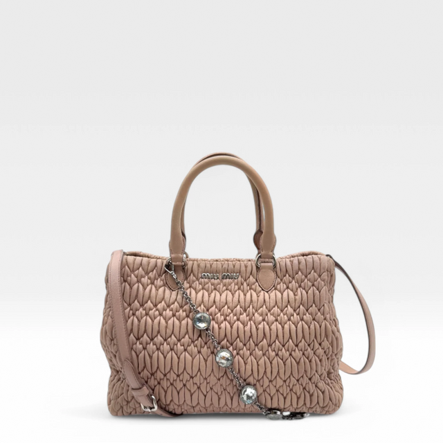 Miu Miu handbag Matelassé with shoulder strap and Miu Miu charm in pink leather