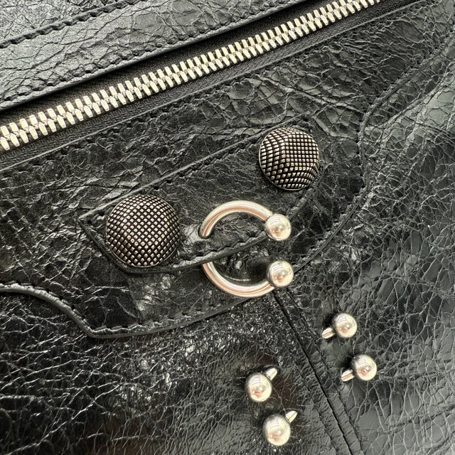Messengertasche Le Cagole mit Piercings