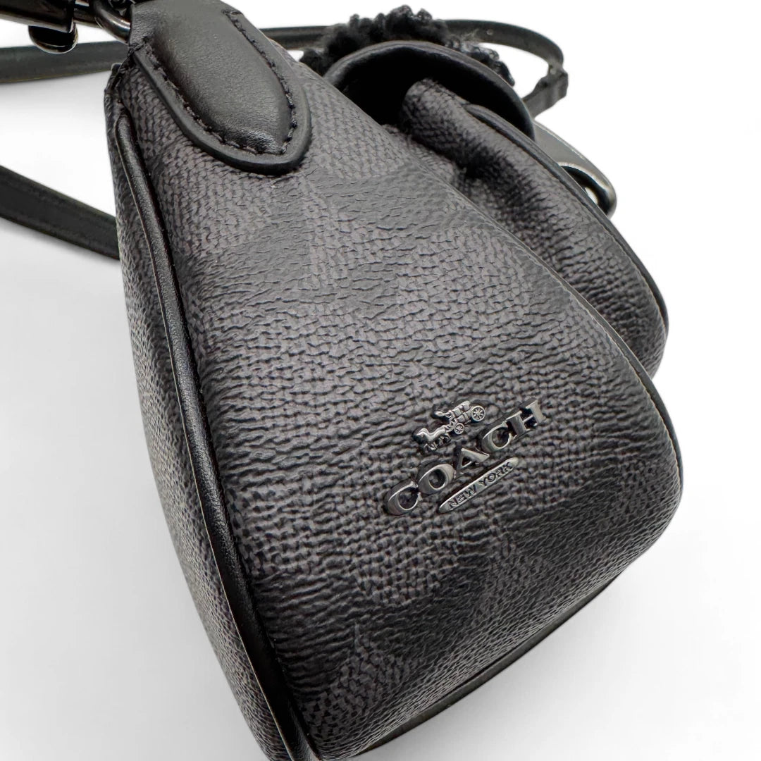 Coach Handtasche Baguette Ashton Shearling & Leder monogram schwarz