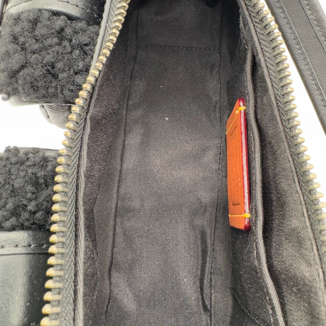 Coach Handtasche Baguette Ashton Shearling & Leder monogram schwarz