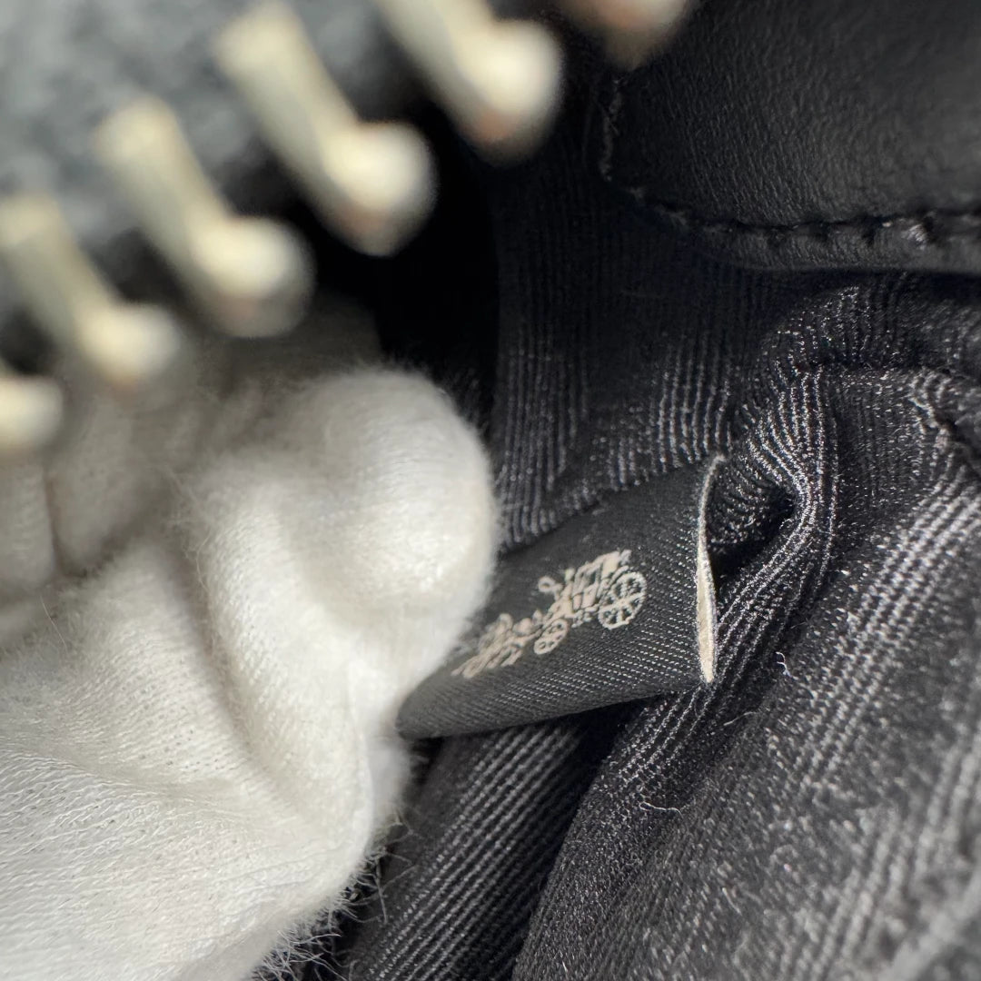 Coach Handtasche Baguette Ashton Shearling & Leder monogram schwarz