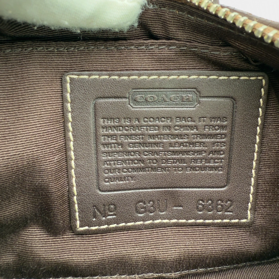 Coach Pochette Soho Signature
