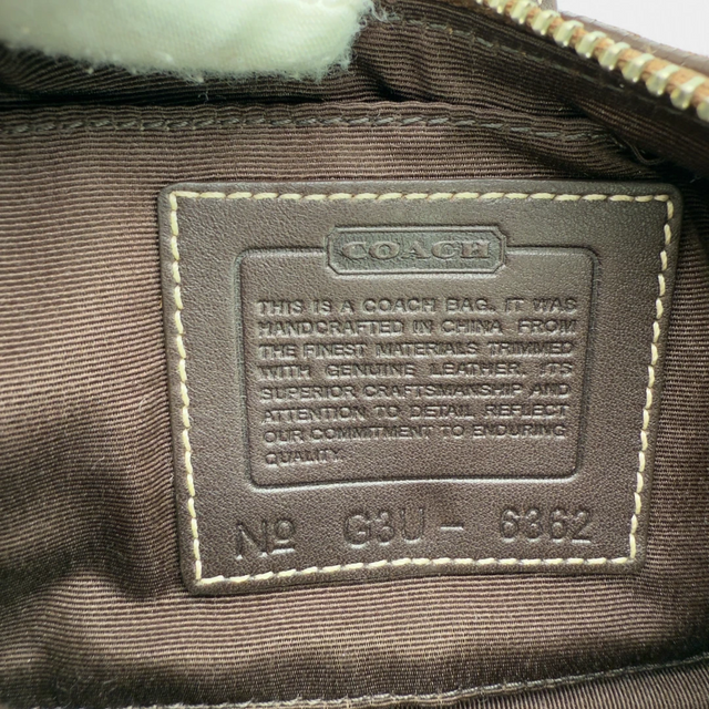 Coach Pochette Soho Signature