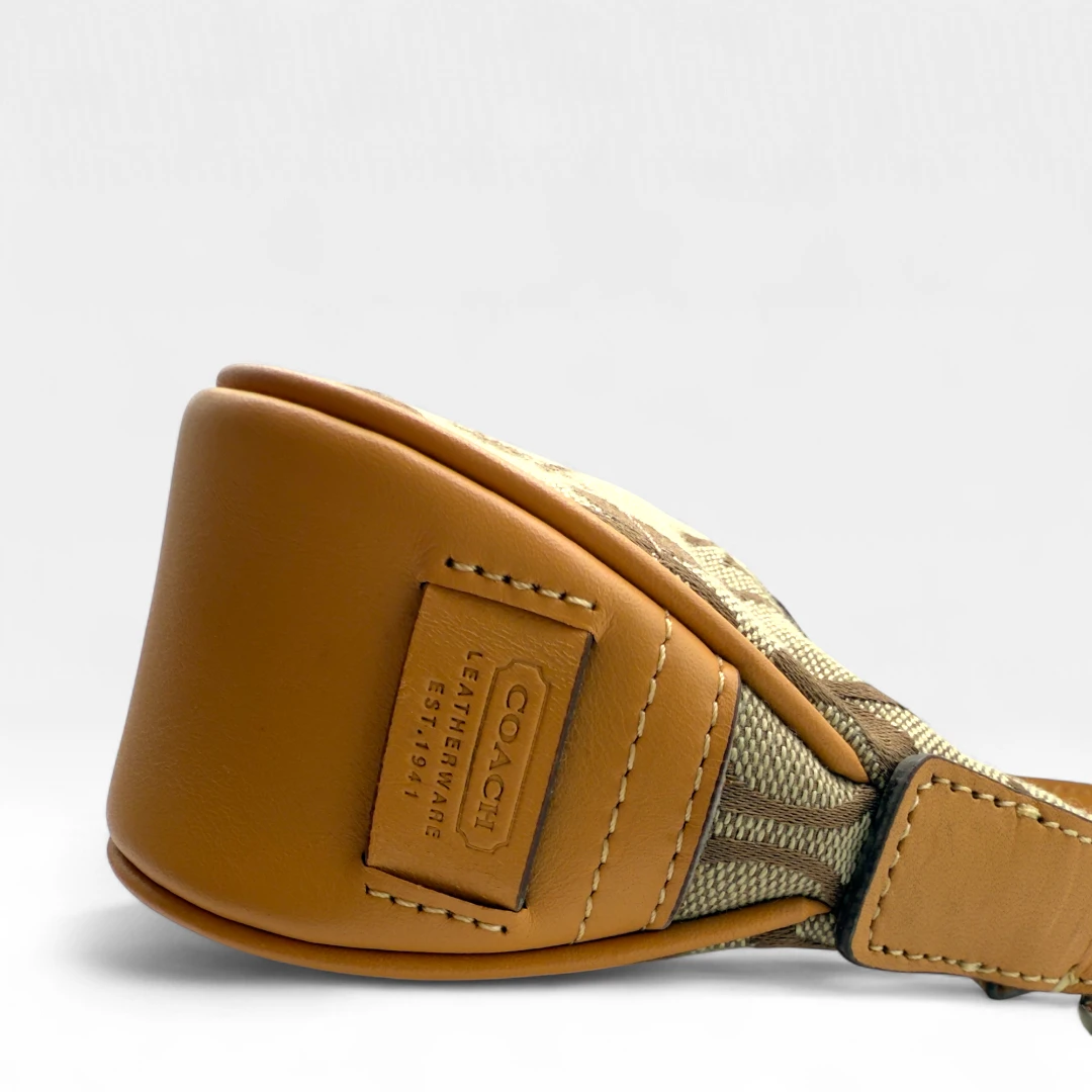 Coach Pochette Soho Signature