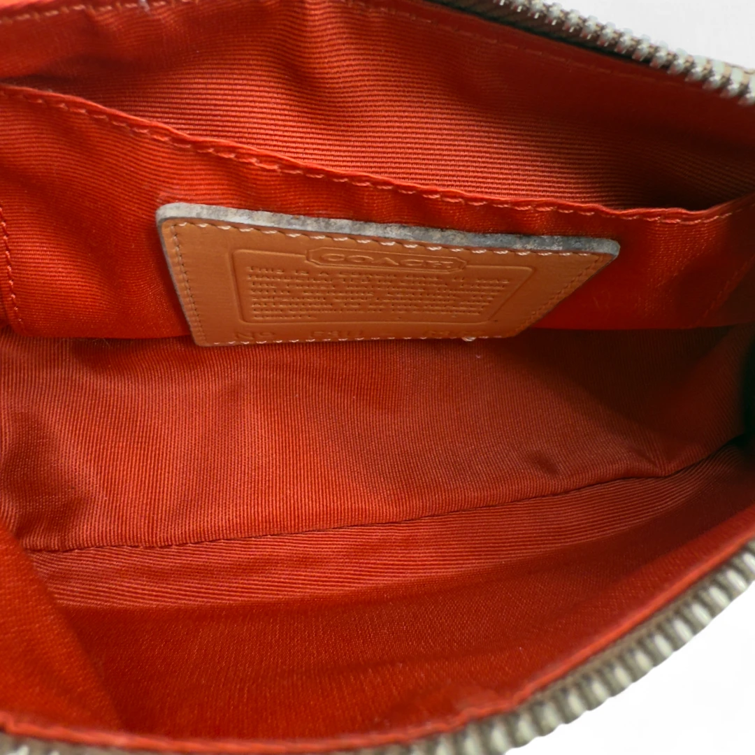 Coach Pochette Soho Signature