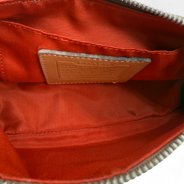 Coach Pochette Soho Signature
