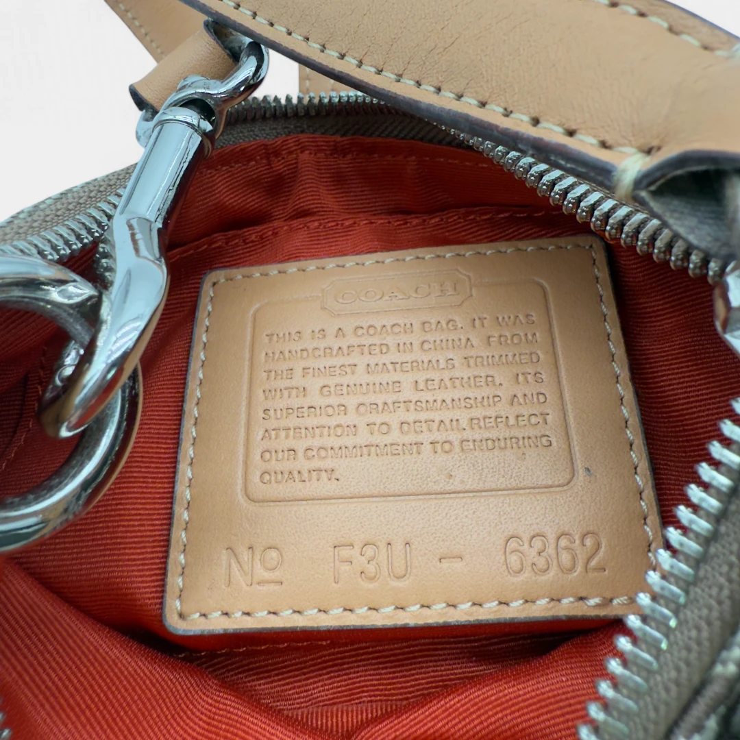 Coach Pochette Soho Signature