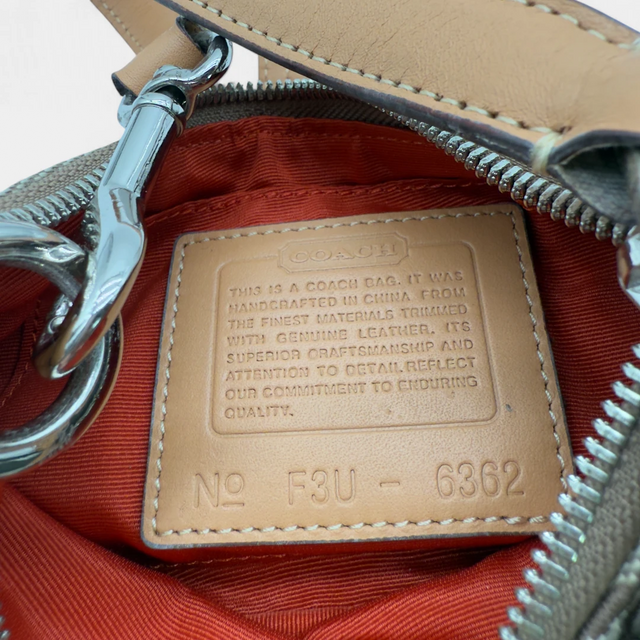 Coach Pochette Soho Signature