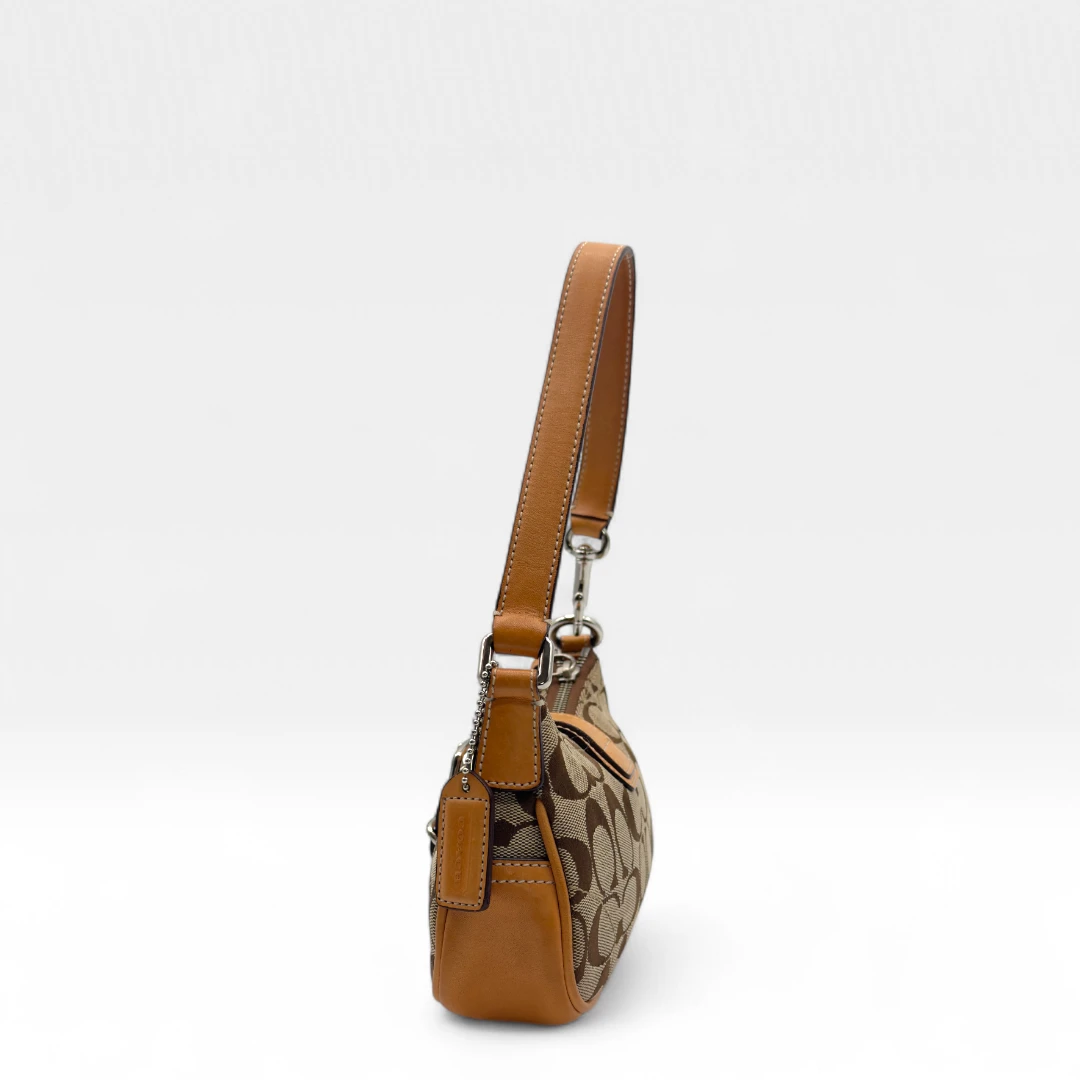 Coach Pochette Soho Signature