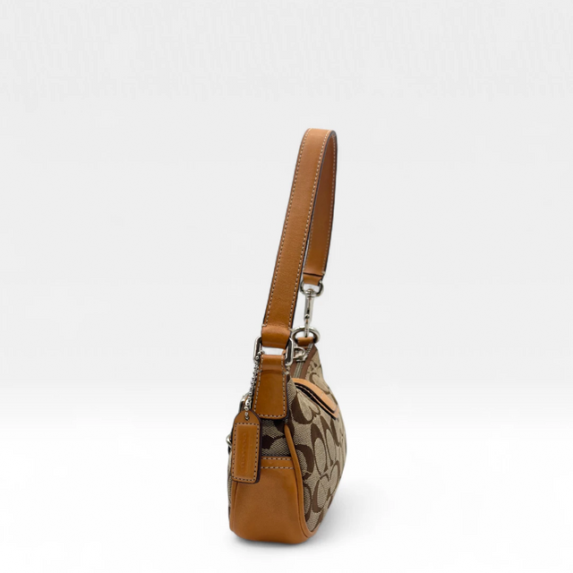 Coach Pochette Soho Signature