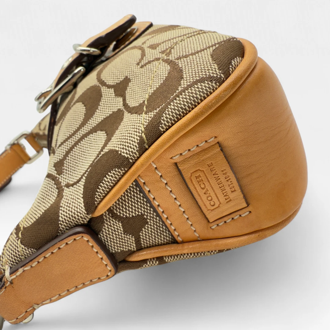 Coach Pochette Soho Signature