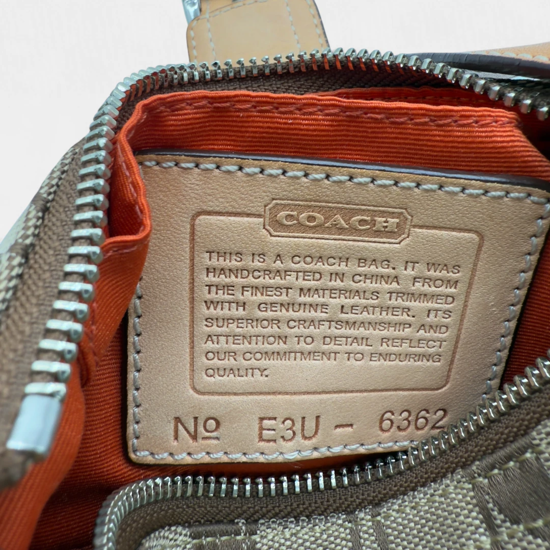 Coach Pochette Soho Signature