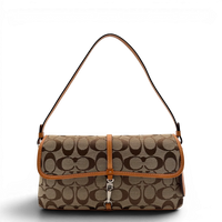Coach Pochette Signature Soho