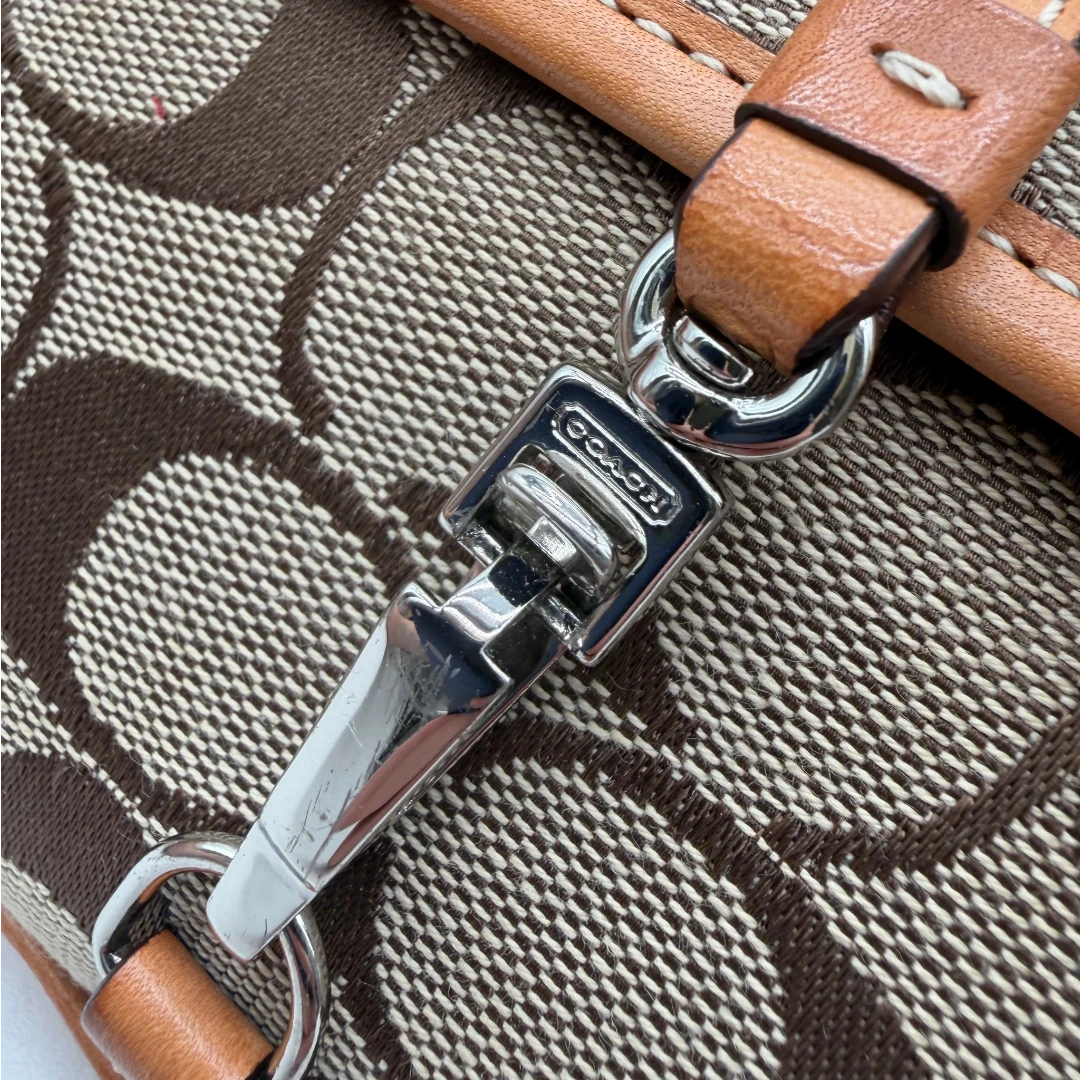 Coach Pochette Signature Soho