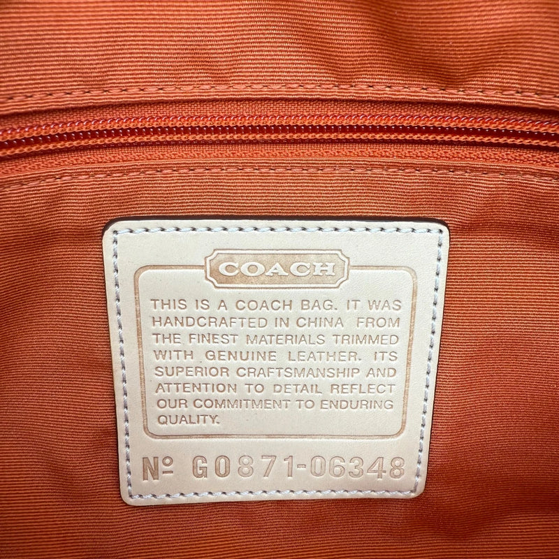 Coach Pochette Signature Soho