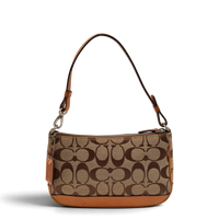 Coach Pochette Signature beige