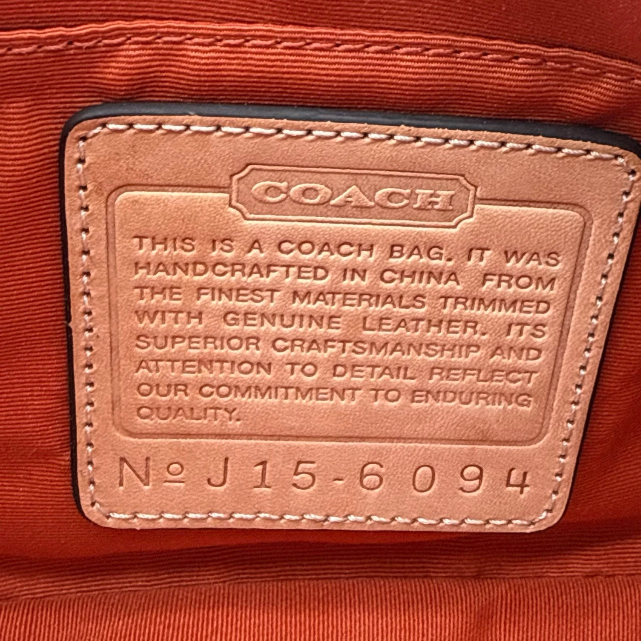 Coach Pochette Signature beige