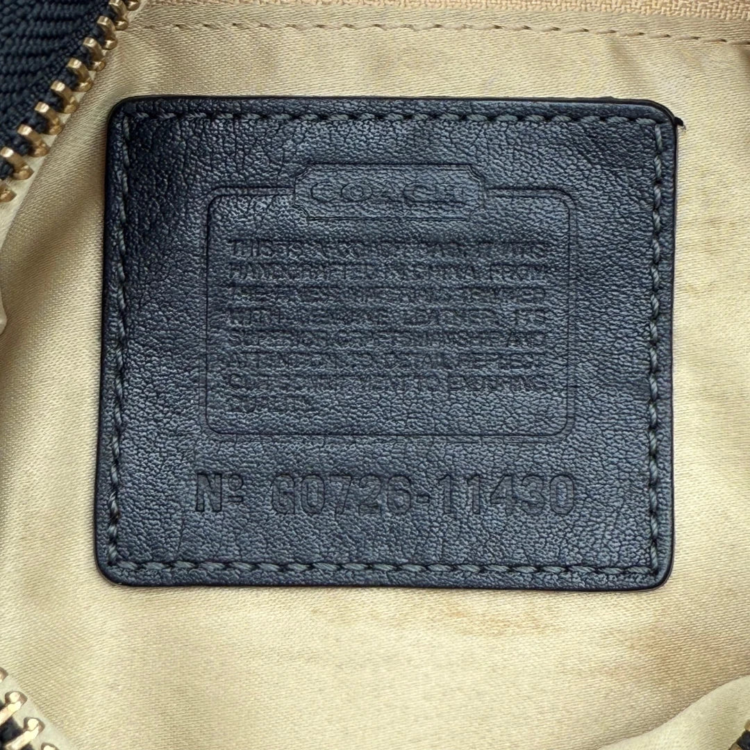 Coach Pochette Signature