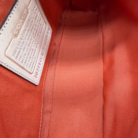 Coach Pochette Signature