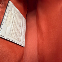 Coach Pochette Signature