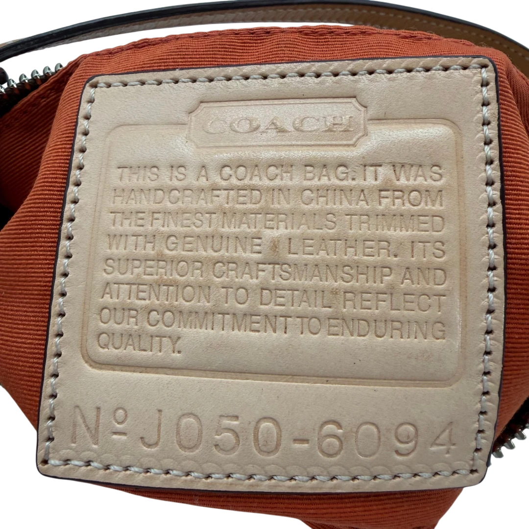Coach Pochette Signature