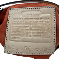 Coach Pochette Signature