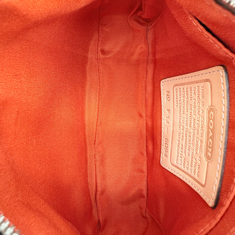 Coach Pochette Signature