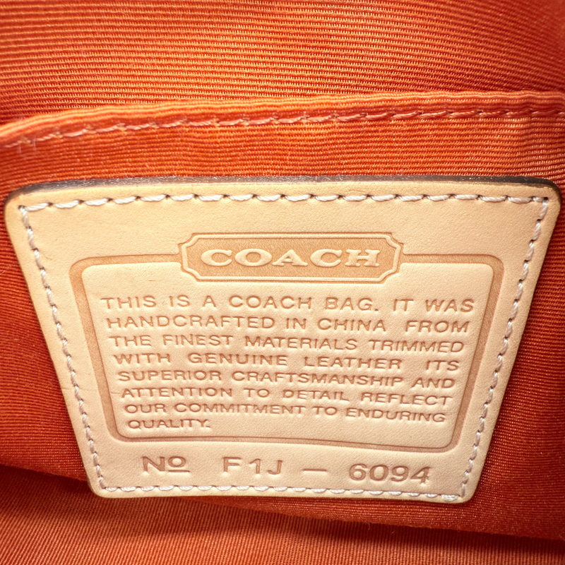 Coach Pochette Signature