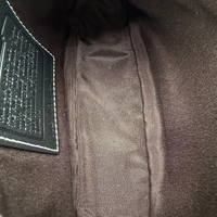 Coach Pochette Signature