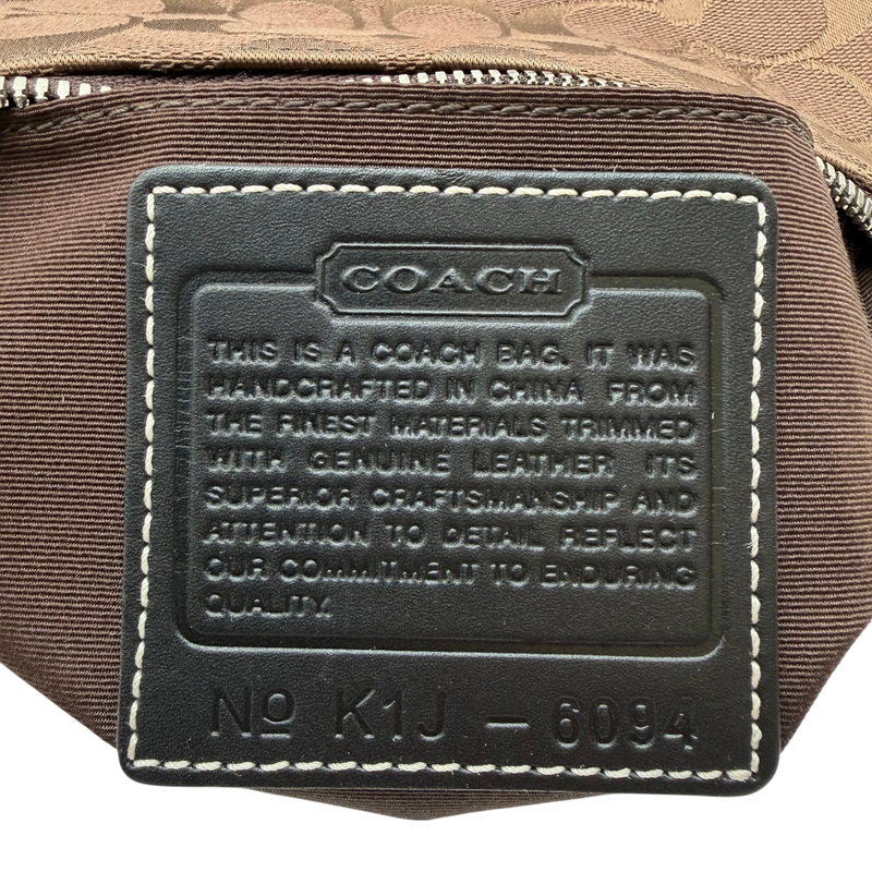 Coach Pochette Signature