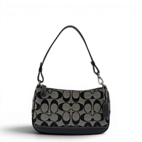 Coach Pochette Signature