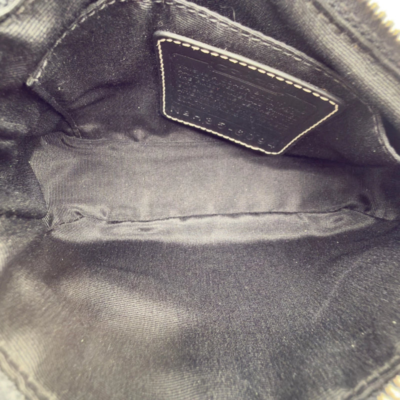 Coach Pochette Signature