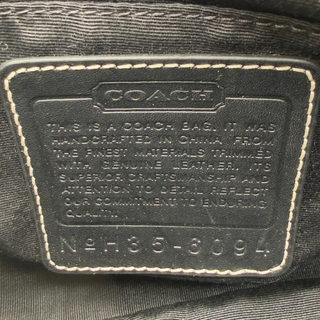 Coach Pochette Signature