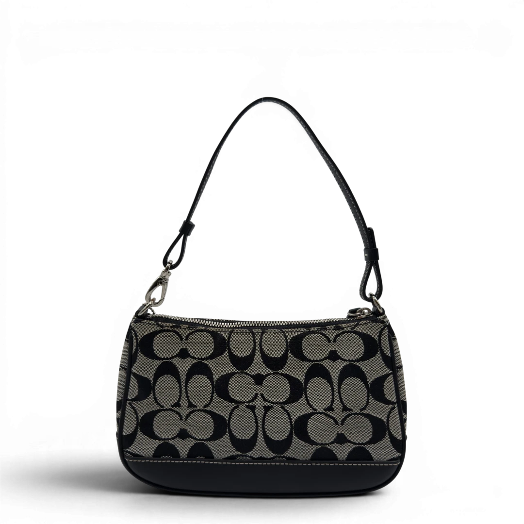 Coach Pochette Signature