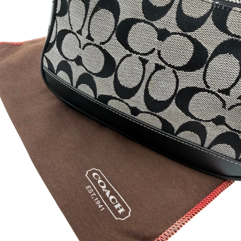 Coach Pochette Signature