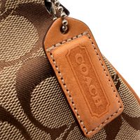 Coach Pochette Signature