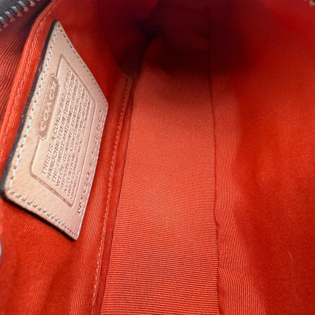 Coach Pochette Signature