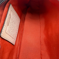 Coach Pochette Signature