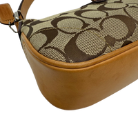 Coach Pochette Signature