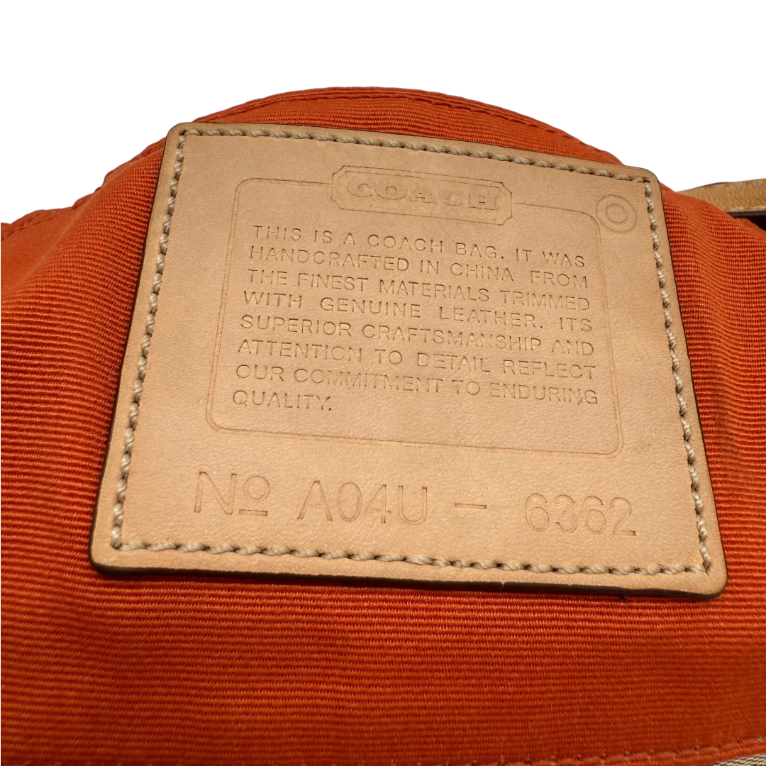Coach Pochette Signature
