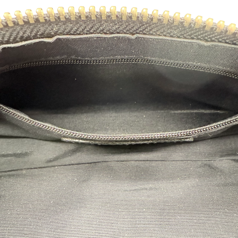 Coach Pochette Signature