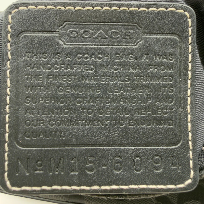 Coach Pochette Signature