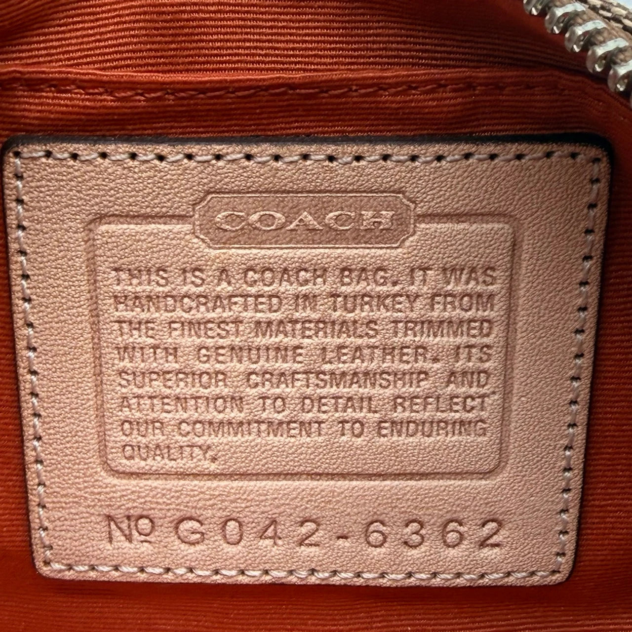 Coach Pochette mit Schnalle Signature beige