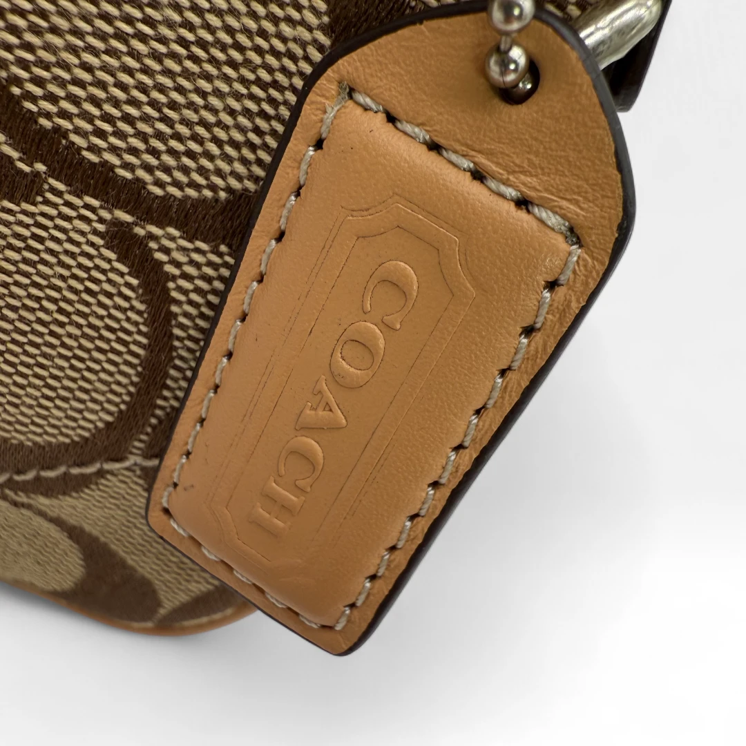 Coach small buckle pouch monogram beige