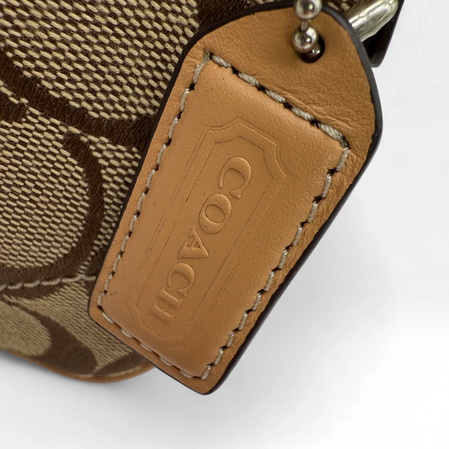 Coach small buckle pouch monogram beige