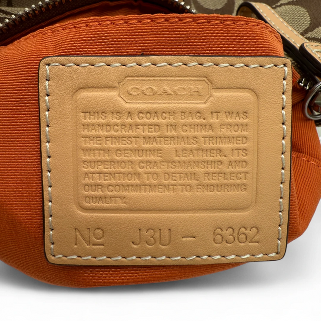 Coach small buckle pouch monogram beige