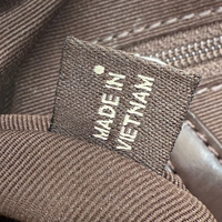 Coach Pochette Signature