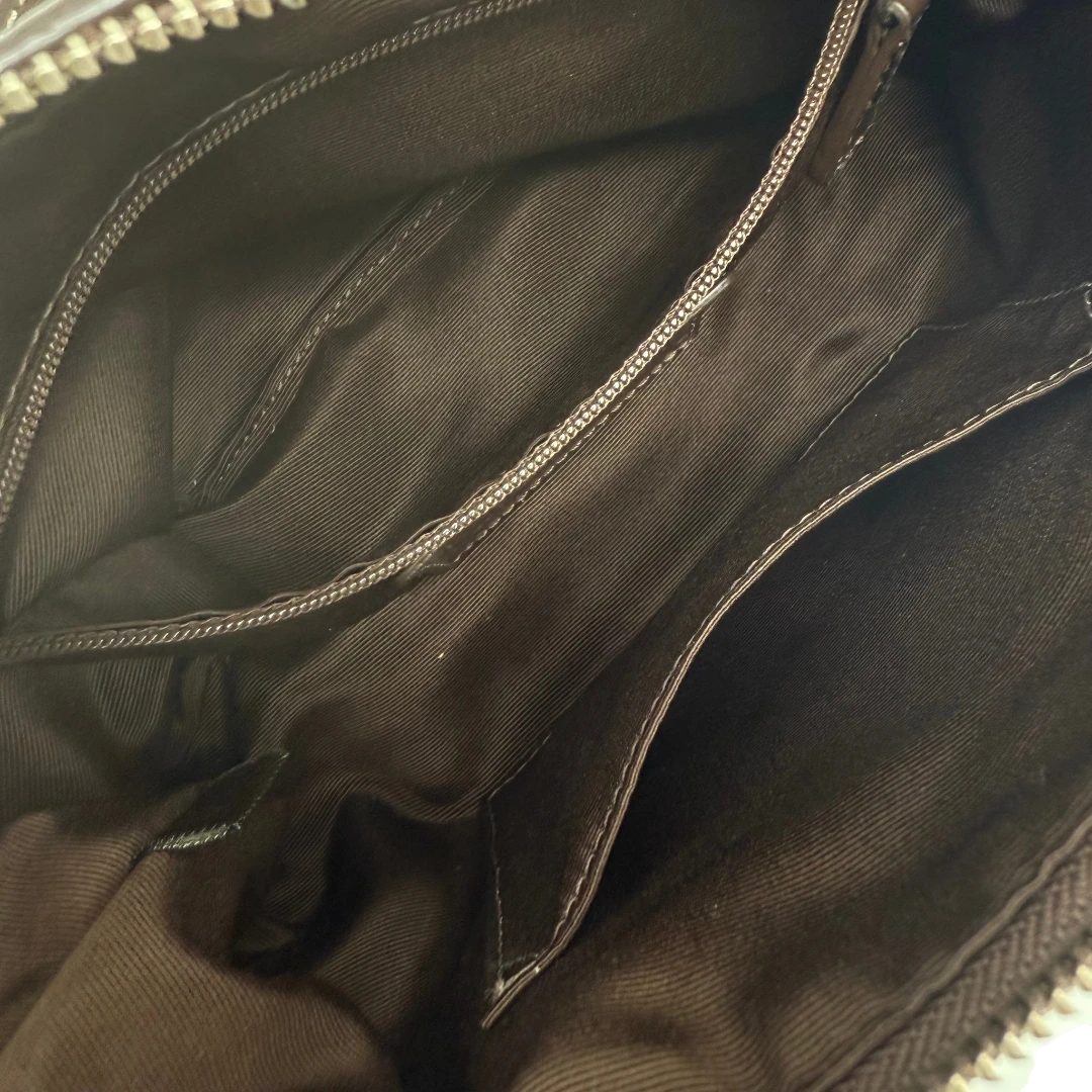 Coach Pochette Signature
