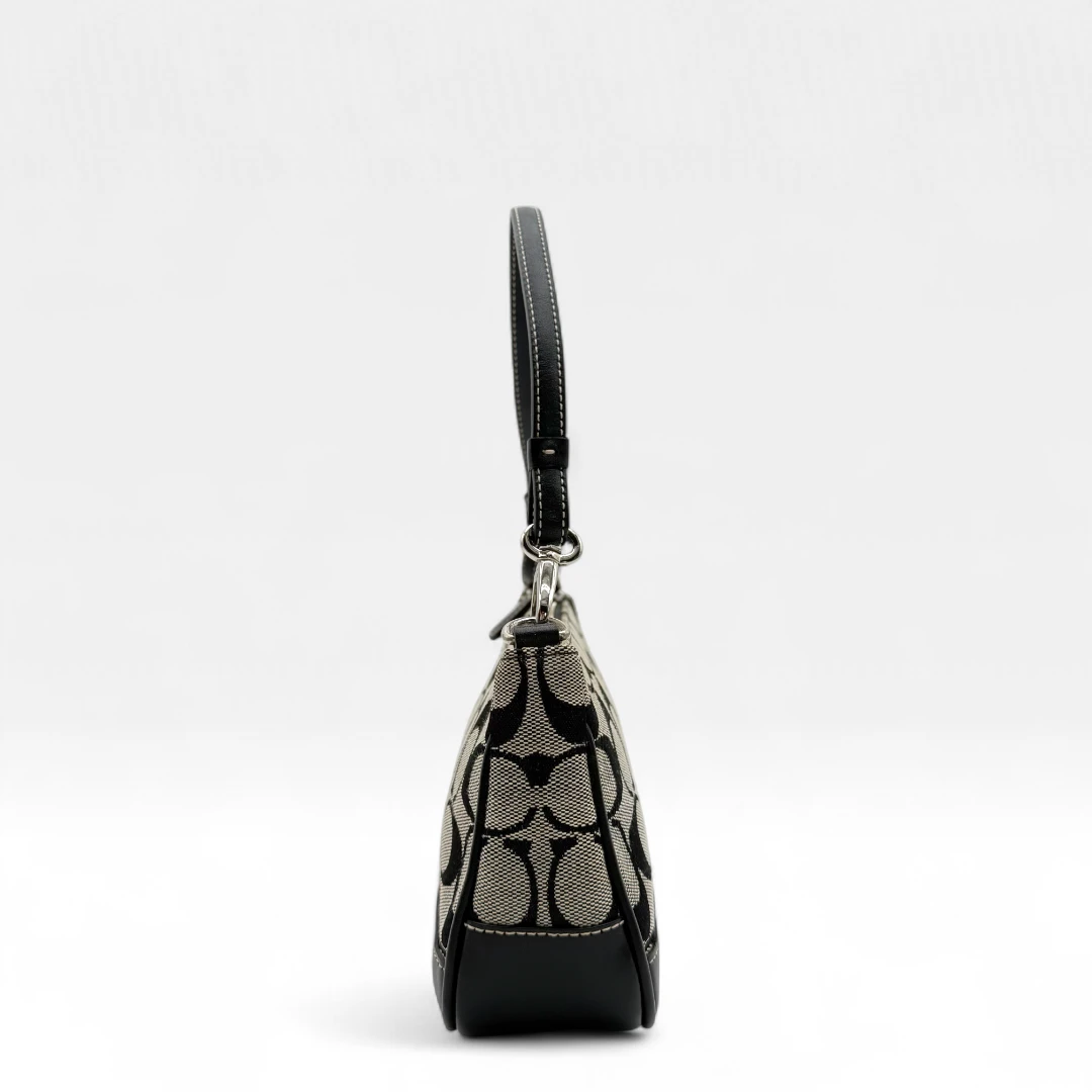 Coach Pochette black leather details monogram beige